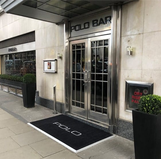 Mat Rental vs Mat Ownership Blog Image - London Bar with Fitted Entrance Mats
